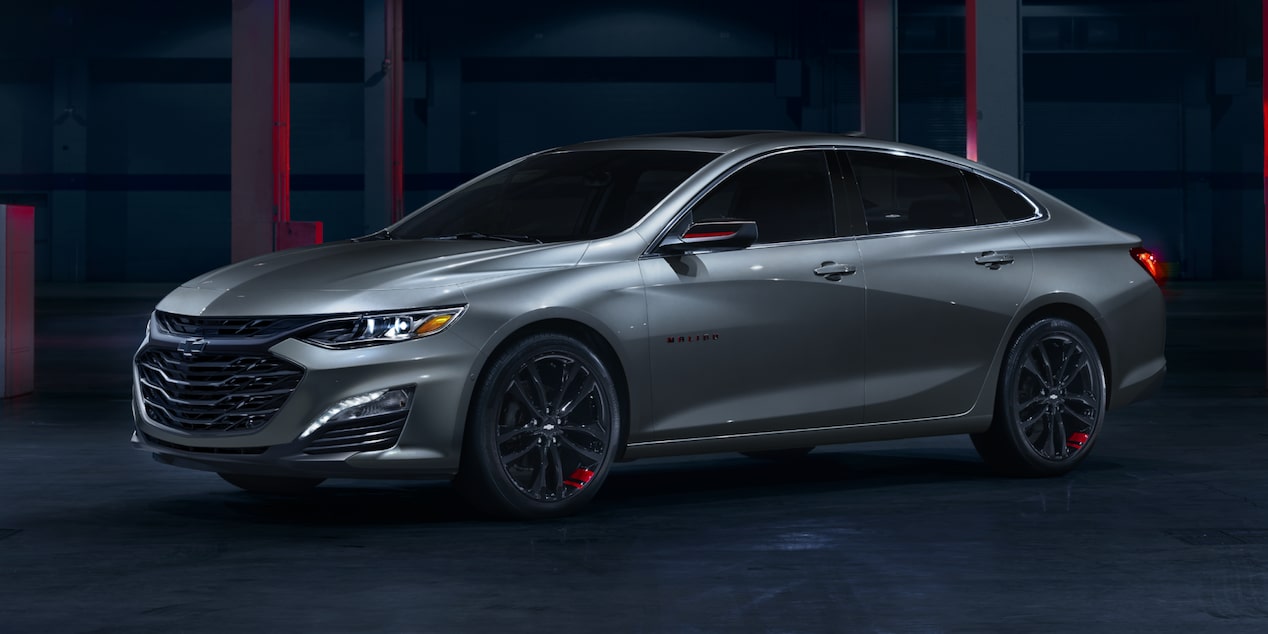 Silver-Colored 2025 Chevy Malibu in a Darkly Lit Environment