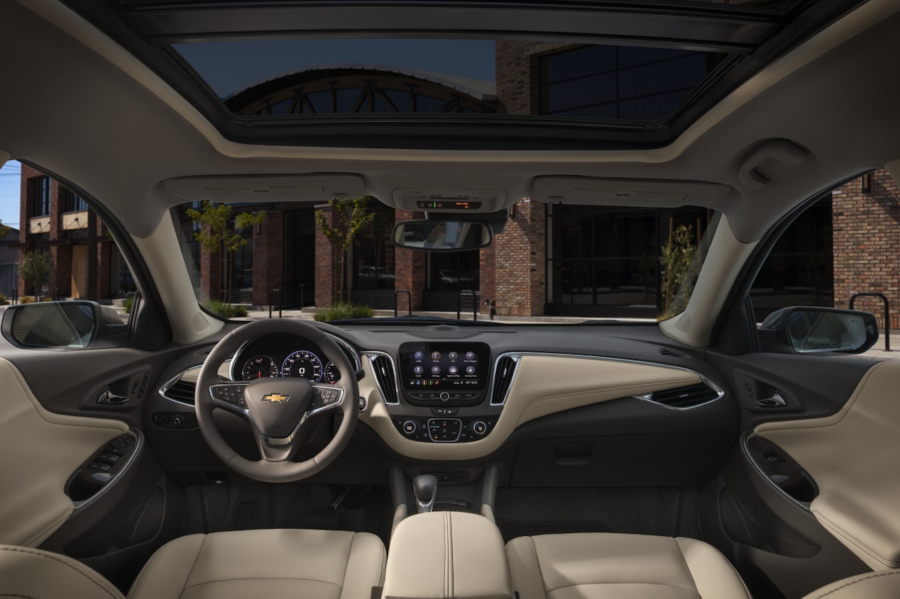 Inside Front and Center View of a 2025 Chevy Malibu Showing the Display Panel and Steering Wheel