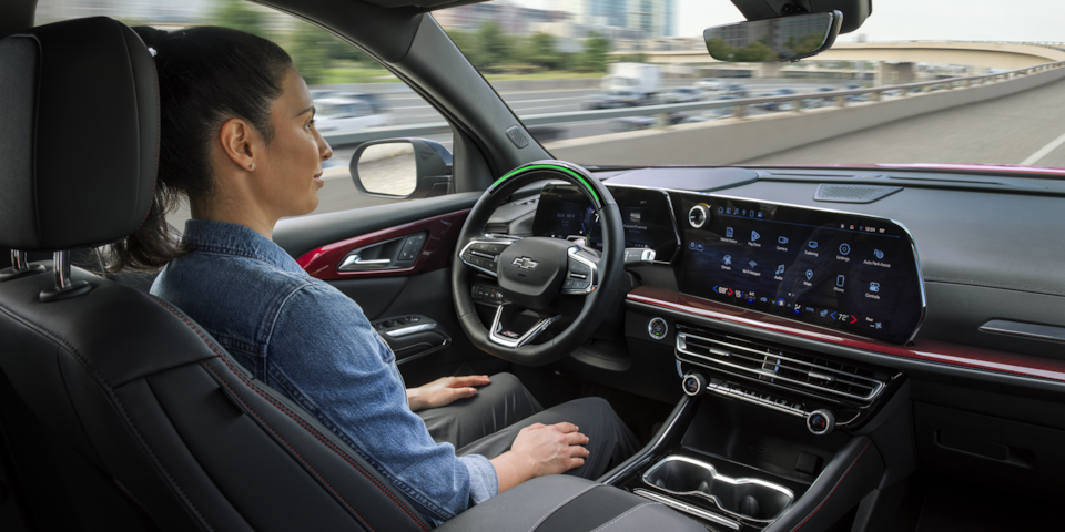 Woman in Front Drivers Seat of Traverse