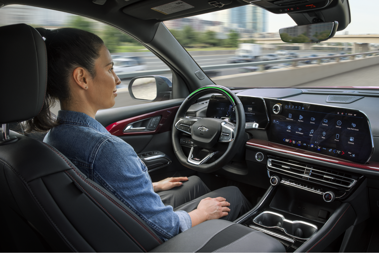 Woman in Front Drivers Seat of Traverse