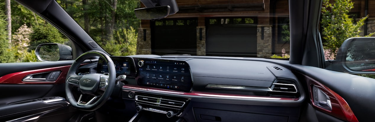 Interior of a Chevrolet Vehicle Parked in Front of a Two-Car Garage