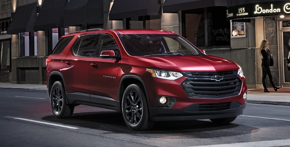 Chevrolet SUV Parked in Front of a Business on the Street