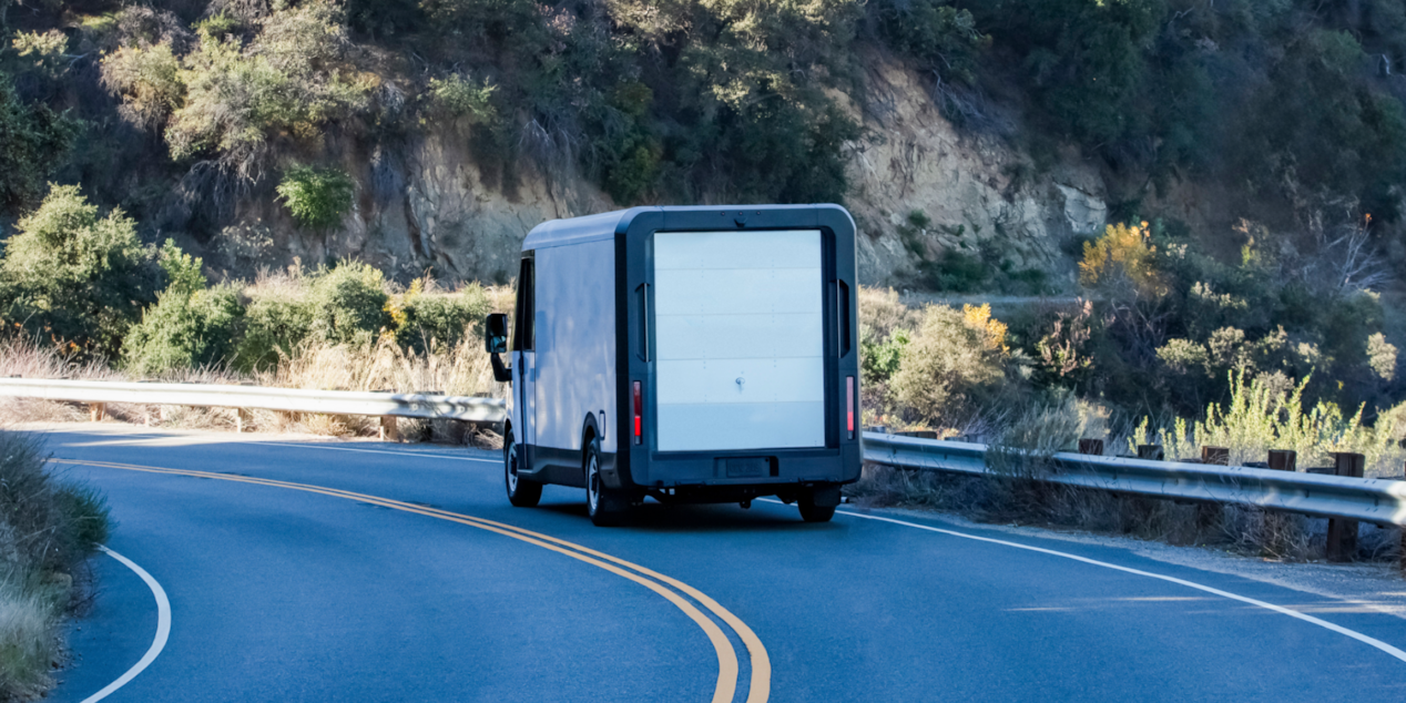 2025 BrightDrop Van Driving on a Curved Road