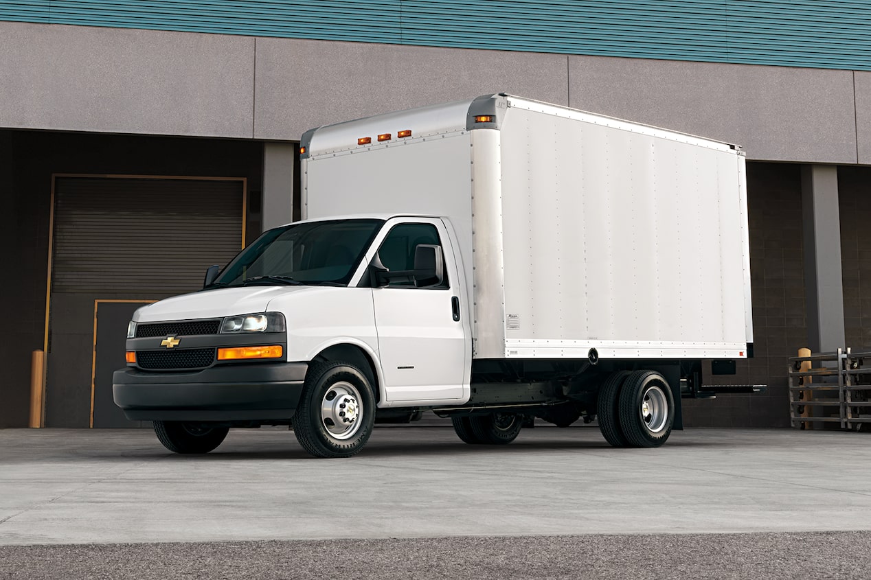 3/4 View Of The 2024 Commercial Express Cutaway Parked Outside a Warehouse