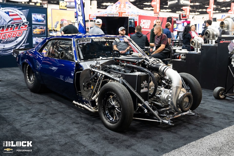 Race cars with extreme engine setups are a fixture of the PRI Trade Show.