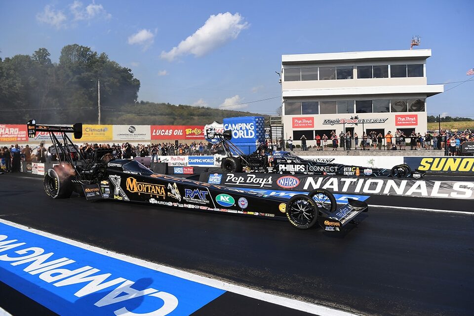 Austin Prock (near lane) drove his Chevrolet Top Fuel dragster to his second career victory on Sunday at Maple Grove Raceway.