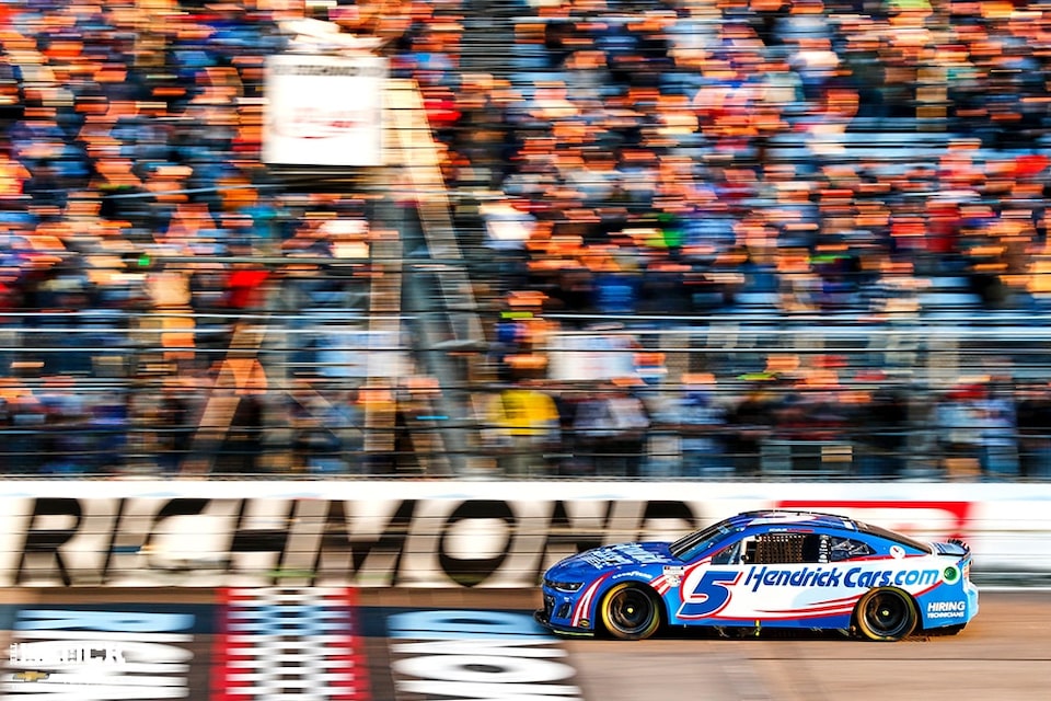 Team Chevy driver Kyle Larson crosses the start-finish line at Richmond Raceway.