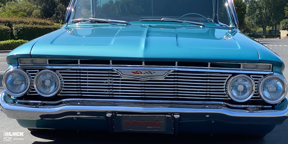 Close-up View of a Restored 1961 Chevrolet Impala's Grille