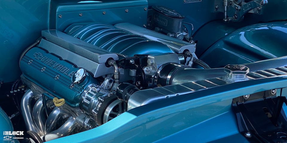 A Chevrolet Performance LS3 crate engine* sits in the car’s clean engine bay.