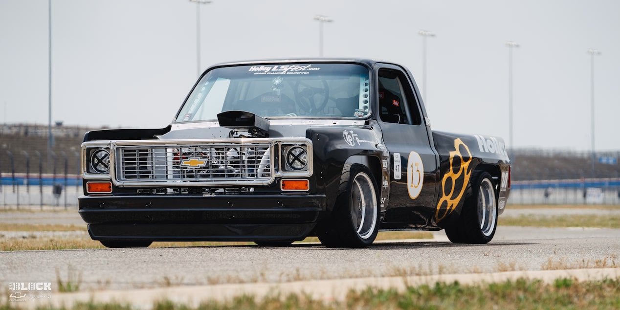 Front Side View of a 1987 Chevy R10 Truck with Racing Autocross Decals