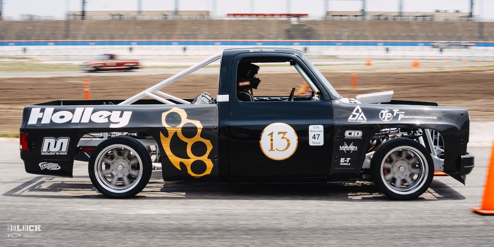 Side View of a 1987 Chevy R10 Truck with Racing Autocross Decals