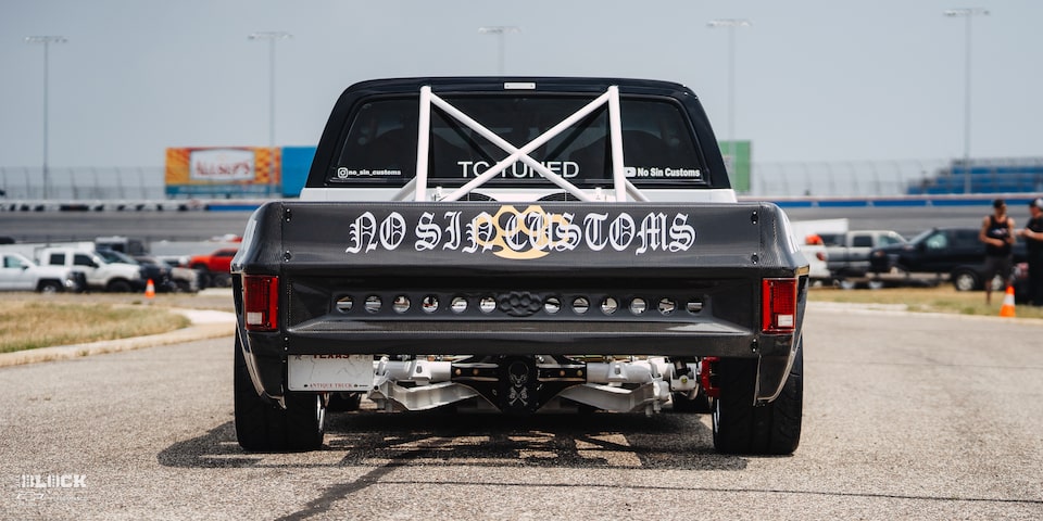 Rear View of a 1987 Chevy R10 Truck with Racing Autocross Decals