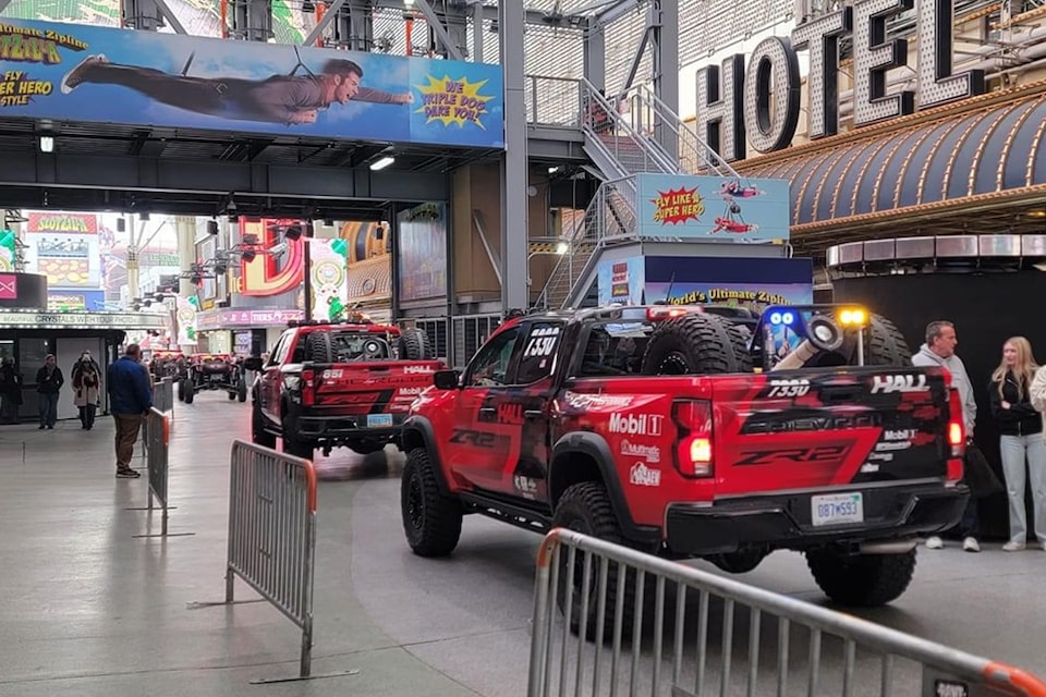 Mint 400 participants can be found on Fremont Street in Las Vegas the Thursday before the event kicks off. Here, the Chevrolet Performance-backed Hall Racing trucks head to the tech area.