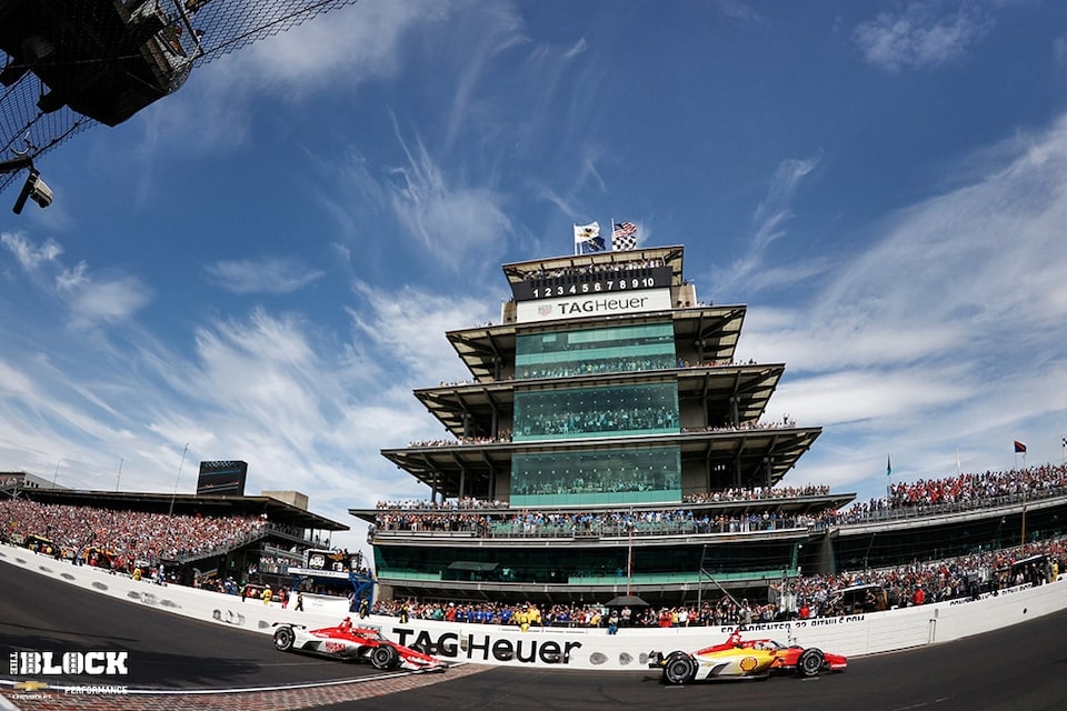 Josef Newgarden takes the checkered flag to score the Indianapolis 500 win for Chevrolet and Team Penske.