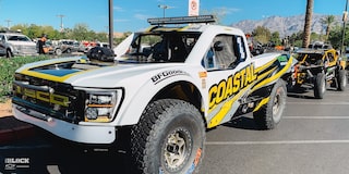 Close-up Front Three-Quarters View of Jake Velasco's Off-Roading Truck Parked in a Parking Lot